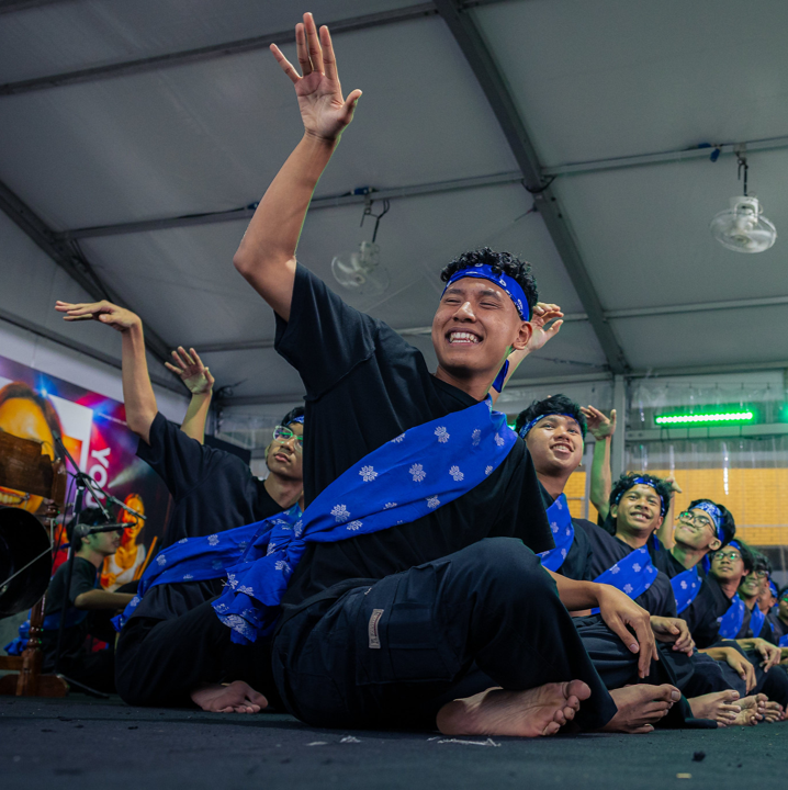 Image of Dikir Barat members performing at an event